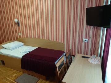 Одноместный номер с общей ванной комнатой в Отеле Tourist Hotel